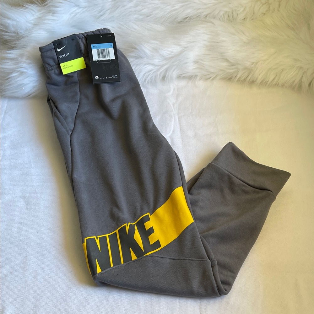 Nike Boys Gray  joggers Sweatpants Size Medium. Brand New With Tags.
